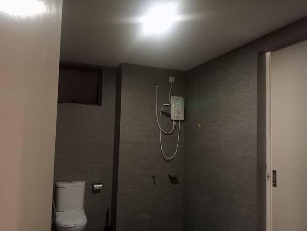 Miracle Woodsbury Habour Place Apartemen *